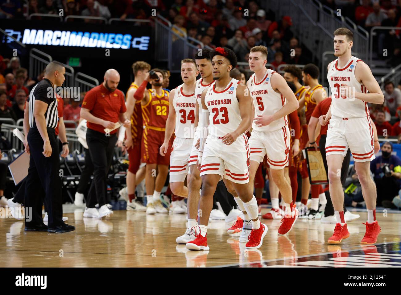 Milwaukee, WI, USA. 20th Mar, 2022. Wisconsin Badgers guard Chucky Hepburn (23), guard Johnny Davis (1), guard Brad Davison (34), forward Tyler Wahl (5), and center Chris Vogt (33) during the NCAA Men's March Madness Tournament basketball game between the Iowa State Cyclones and the Wisconsin Badgers at the Fiserv Forum in Milwaukee, WI. Darren Lee/CSM/Alamy Live News Stock Photo