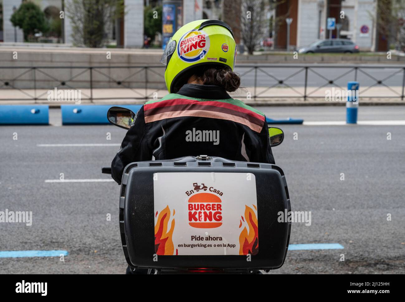 Madrid, Spain. 19th Mar, 2022. A delivery courier from the American chain of hamburger fast food restaurants Burger King rides a motorcycle in Spain. (Credit Image: © Xavi Lopez/SOPA Images via ZUMA Press Wire) Stock Photo