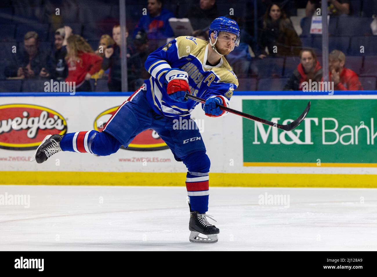 March 18, 2022: Rochester Americans forward Ben Holmstrom (18) wears a  local high school jersey while taking warmups prior to a game against the Cleveland  Monsters.The Rochester Americans hosted the Cleveland Monsters