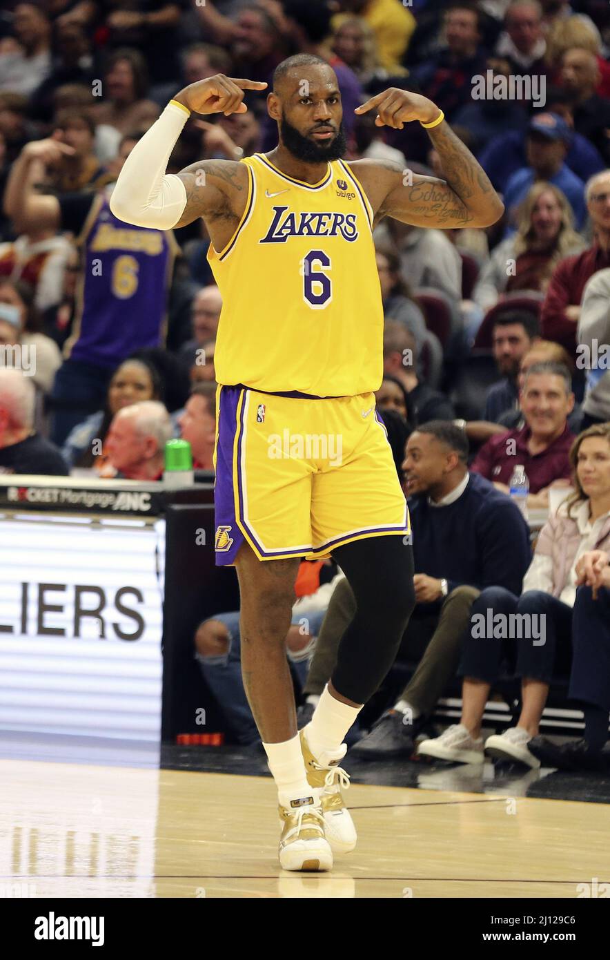 Cleveland, United States. 21st Mar, 2022. Los Angeles Lakers LeBron James  (6) reacts after a dunk against the Cleveland Cavaliers at Rocket Mortgage  FieldHouse in Cleveland, Ohio on Monday, March 21, 2022.