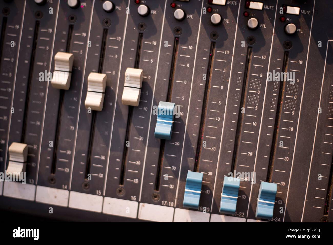 Sound engineer using mixing console to produce a sound track Stock ...
