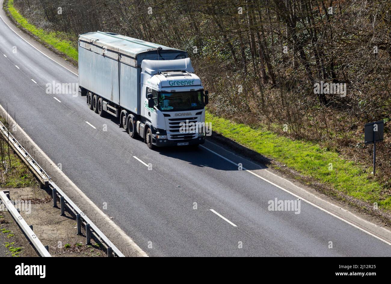 Scania Greener lorry HGV on A12 dual carriageway road, Loudham, Suffolk, England, UK Stock Photo