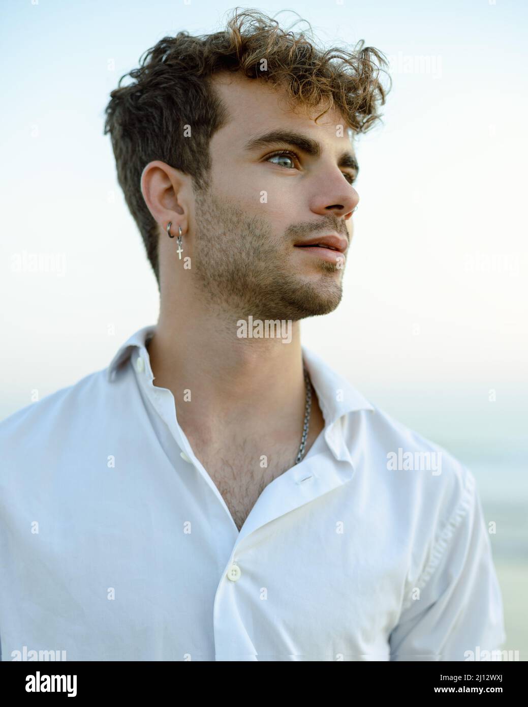 Portrait of a Caucasian (White) Spanish male with an earring Stock Photo