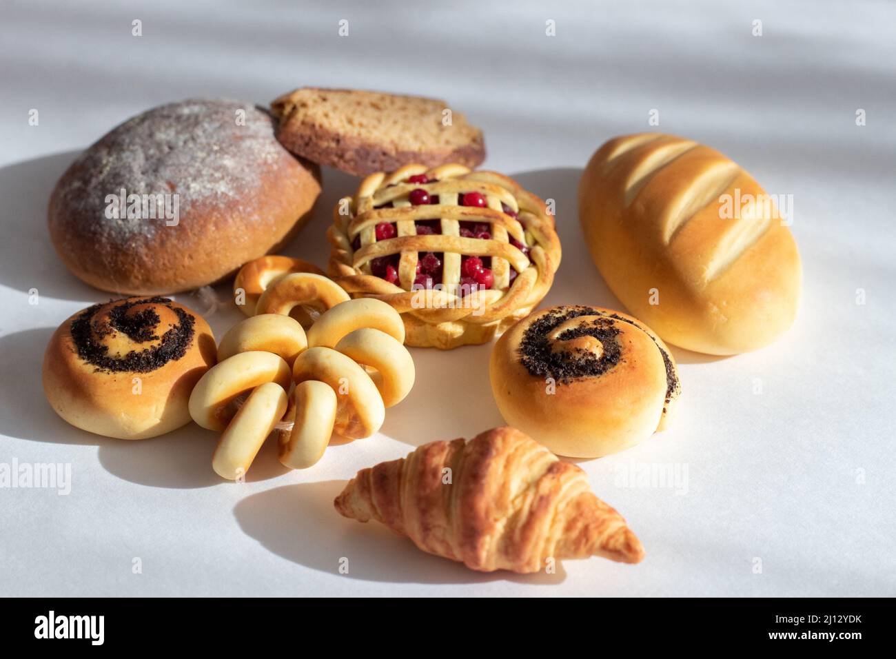 Miniature of bakery pastries in close-up on an isolated background ...