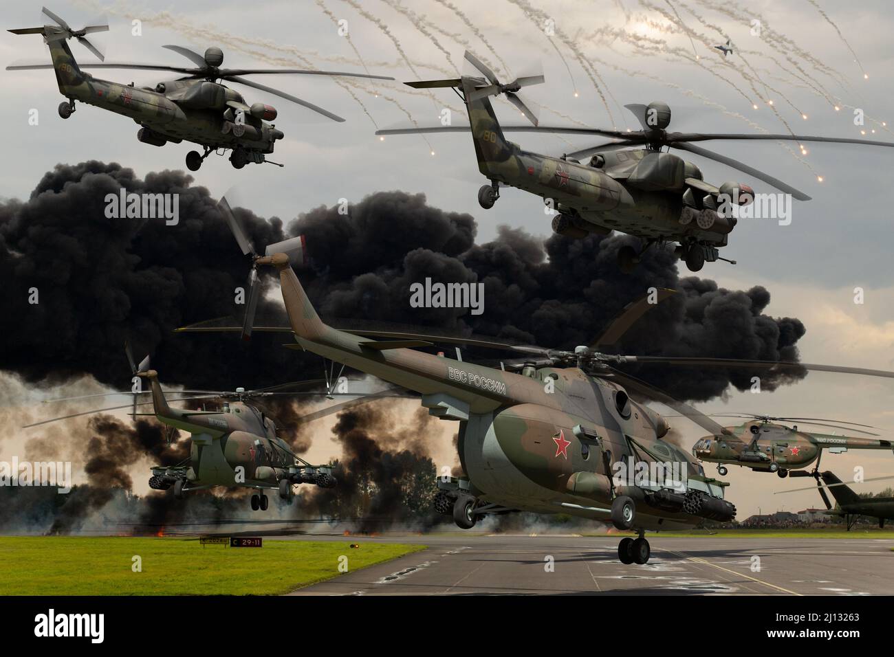 Russian Mi-28 and Mi-8 attack helicopters during the attack on the airfield Stock Photo
