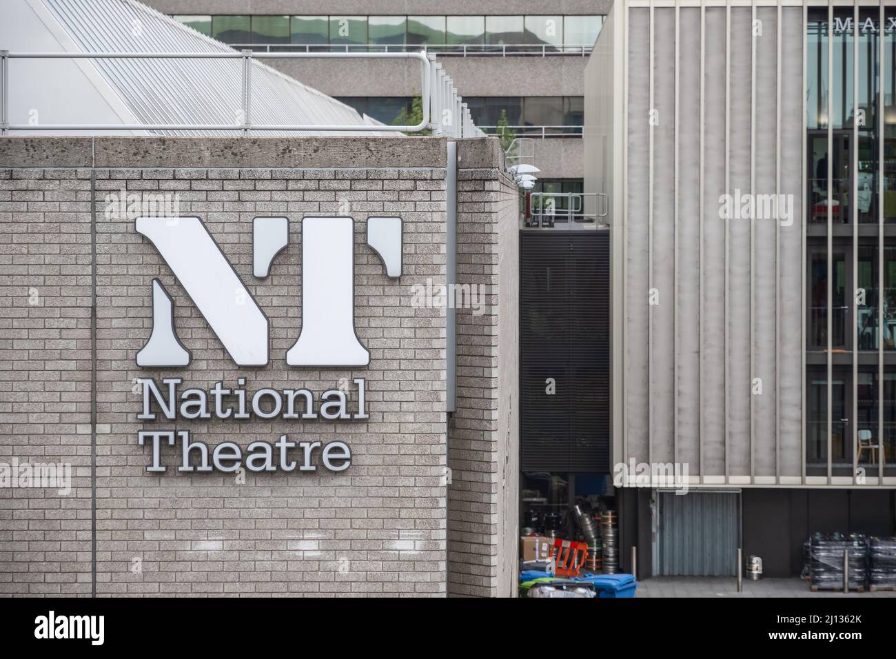 London, UK - July 19, 2021 - The signage and Brutalist architecture of the National Theatre in the South Bank area Stock Photo