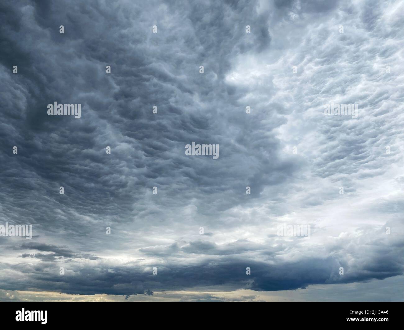 Dark blue cloudy sky with low clouds Stock Photo - Alamy