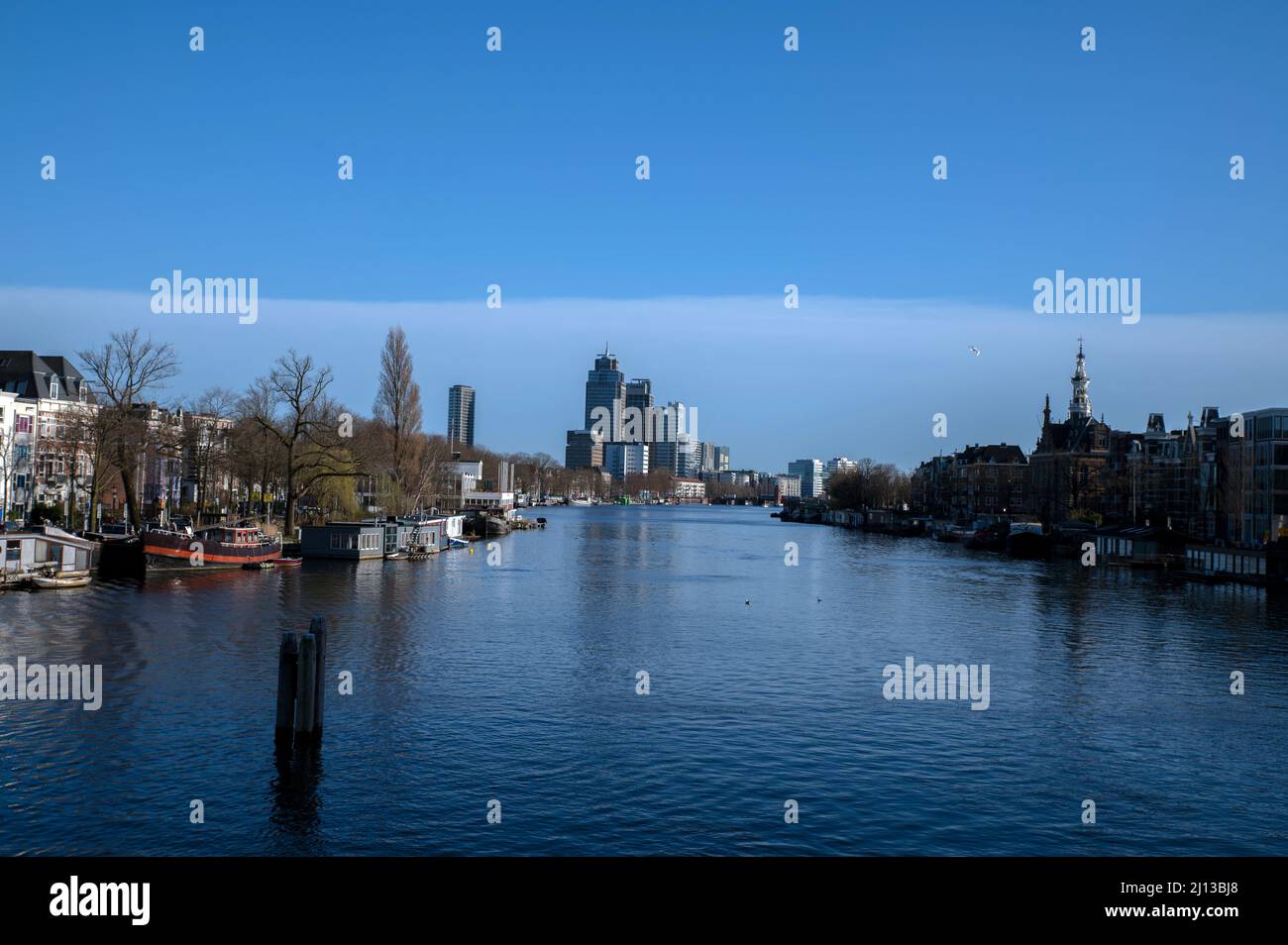 View From The Nieuwe Amstelbrug Bridge At The Amstelriver Amsterdam The Netherlands 17-3-2022 Stock Photo