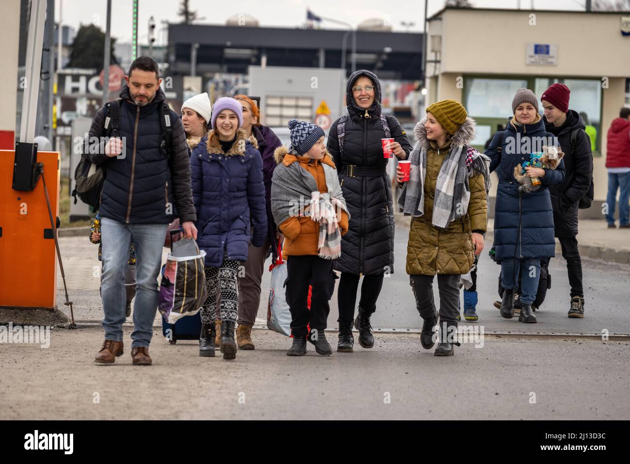 Arrival of refugees from Ukraine at the Polish-Ukrainian border crossing in Medyka. Here the refugees are provided with warm food and clothing. From here, they are forwarded by bus to large sites or collective shelters. Foreign helpers also offer trips to other European countries. Stock Photo