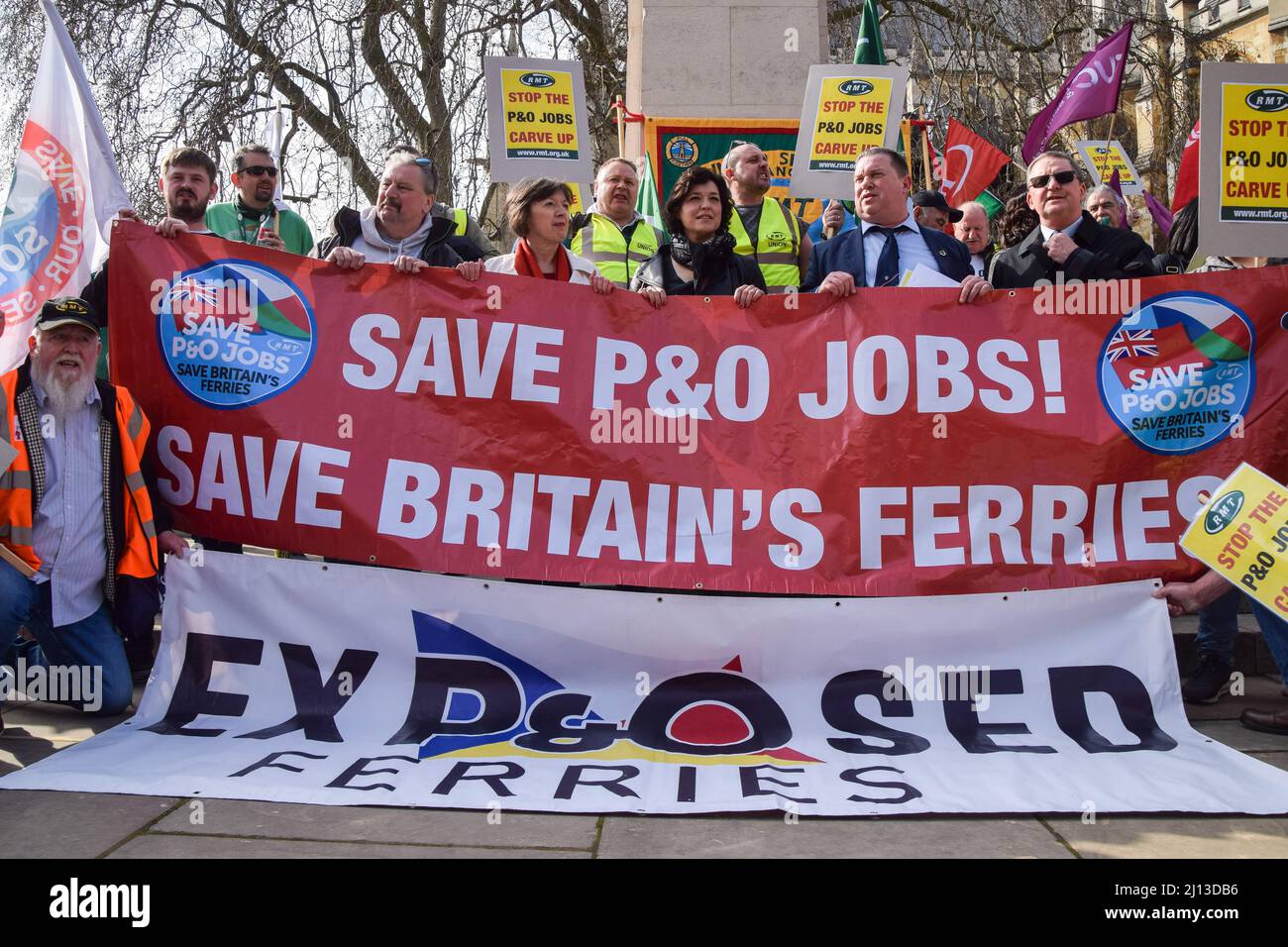 London, UK. 21st March 2022. Protesters outside the Parliament. P&O Ferries staff and RMT Union members marched from the headquarters of DP World, the company which owns P&O, to Parliament, after 800 UK staff were fired and replaced by agency workers. Stock Photo