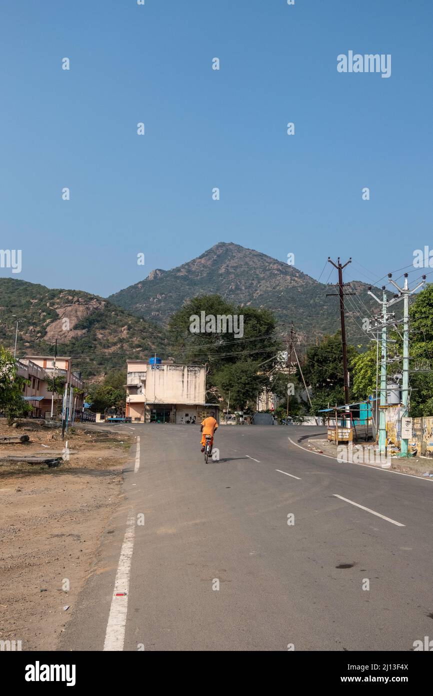 Arunachala is a hill in Tiruvannamalai, Tamil Nadu, and one of the five main Shaiva holy places in South India.The Arunachalesvara Temple to Shiva is Stock Photo