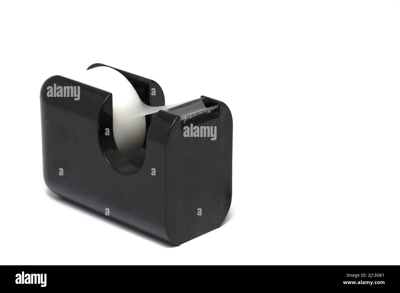 Close up partial side view of black office tape dispenser with clear