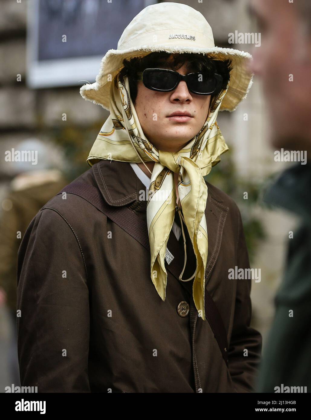 PARIS, France- March 5 2022: Men on the street in Paris. Stock Photo