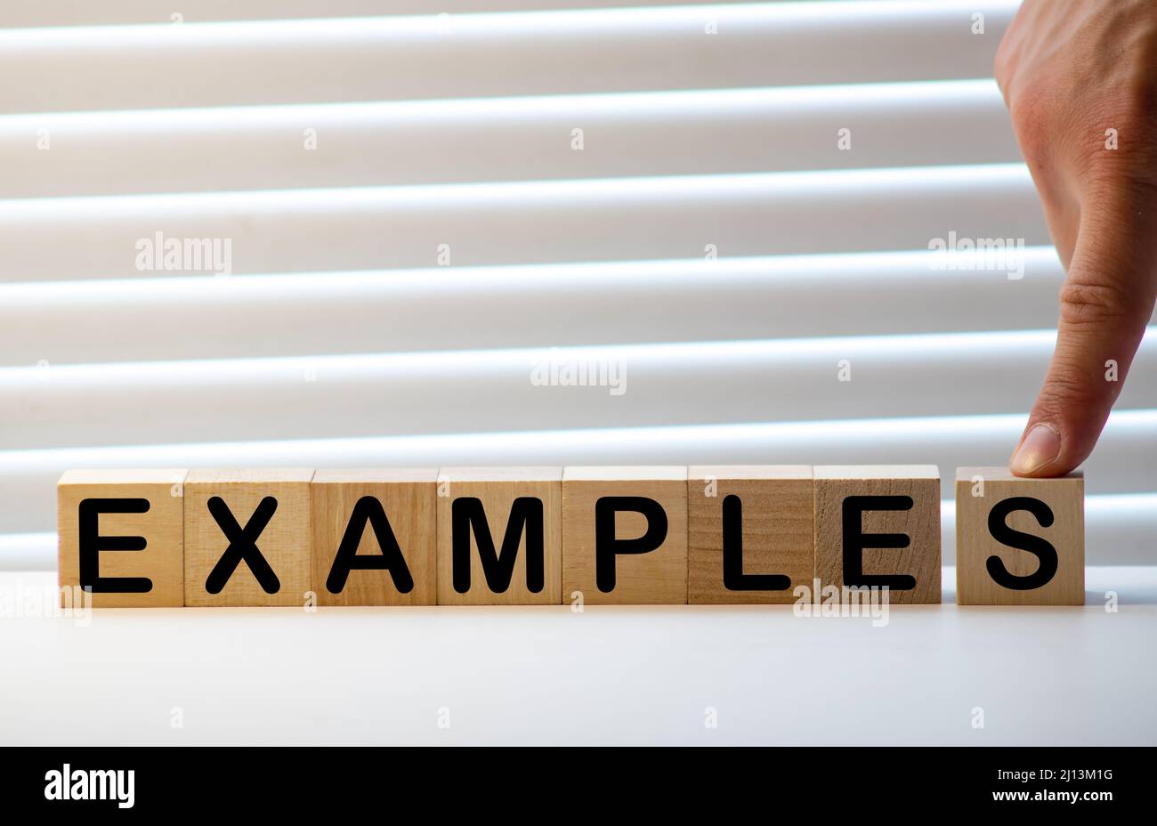 EXAMPLE word made with building blocks isolated on white Stock Photo ...