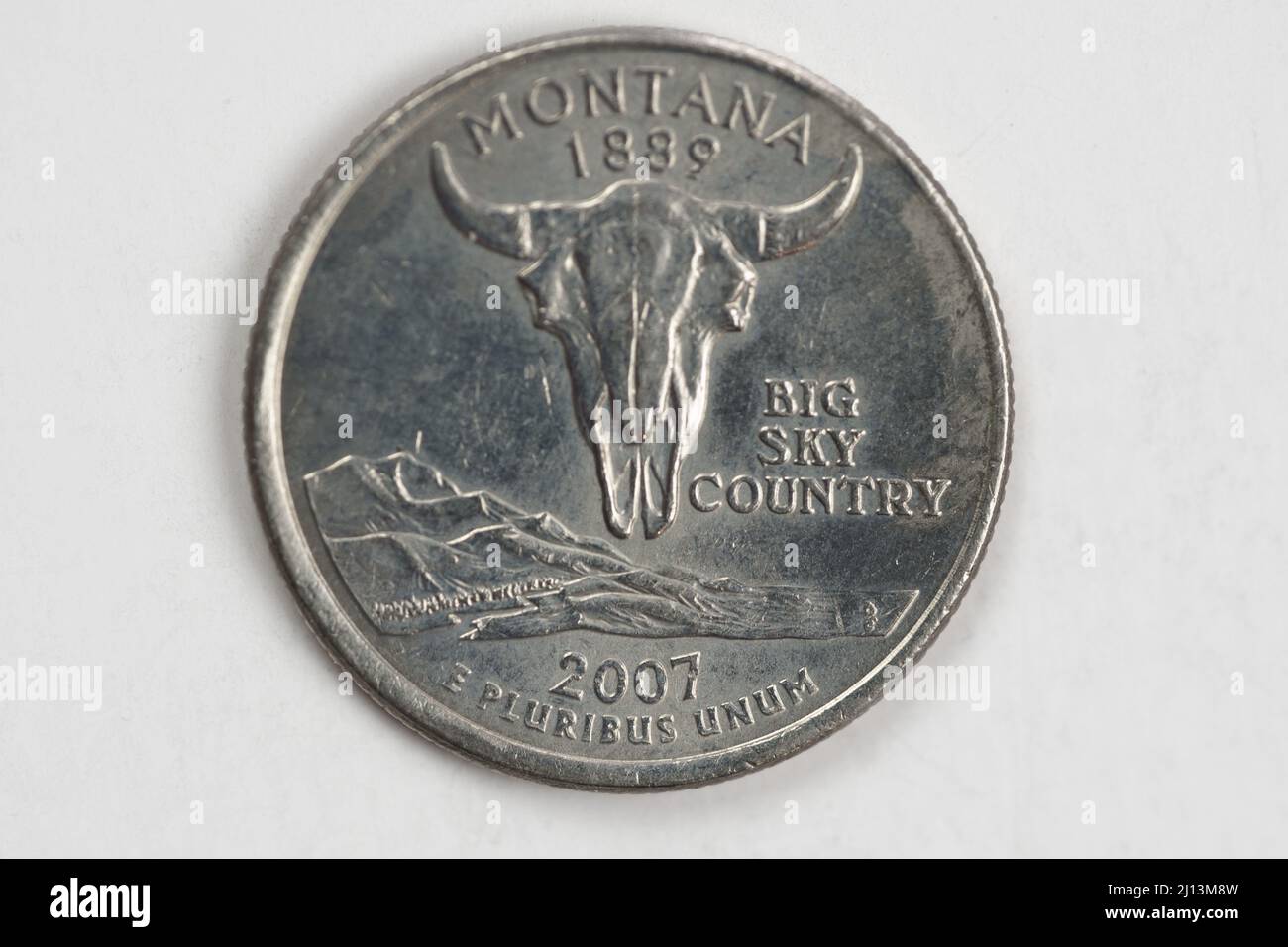 A quarter dollar (25 cents) coin with the image of Montana (the Treasure State), USA. Stock Photo