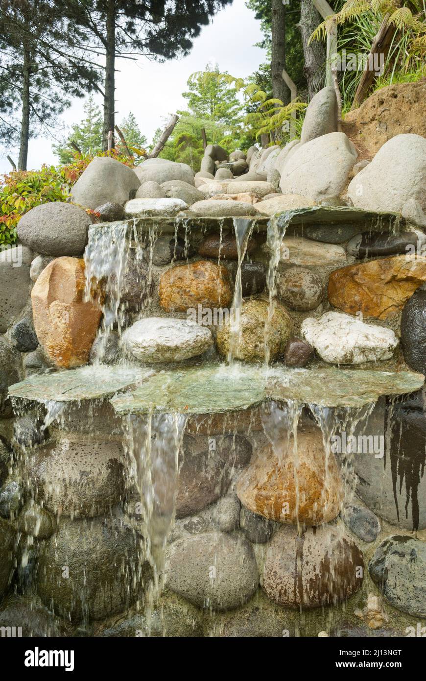 Artificial waterfall made with stones, outdoor installation, nonpotable water Stock Photo Alamy