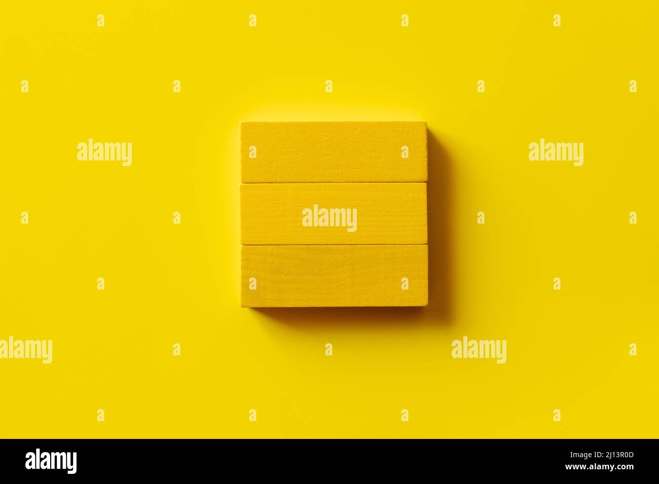 Yellow Rectangular Blocks top view of square made of rectangular blocks on yellow background ...