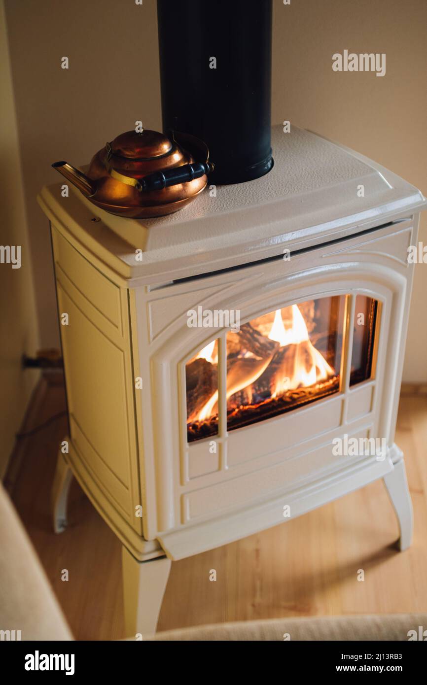 fireplace with copper tea kettle Stock Photo Alamy