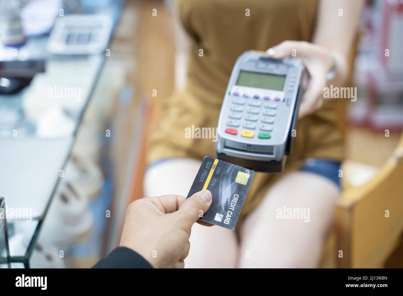 Credit card payment, credit card machine Stock Photo - Alamy