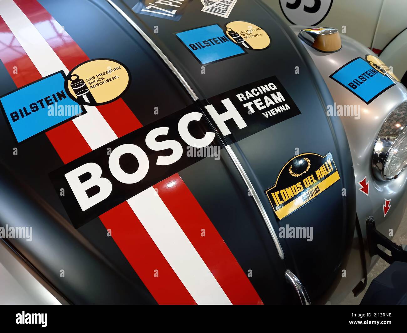 Bosch Racing Team and Bilstein shocks logos on hood of a sport gray