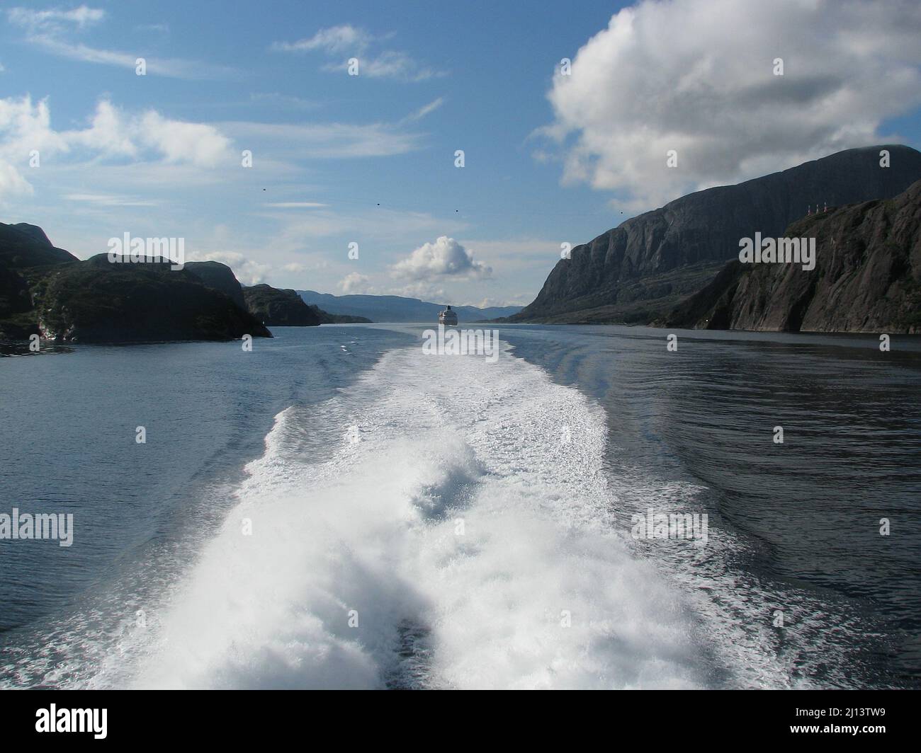 back view in the keel water on the departing mail ship of Hurtigruten