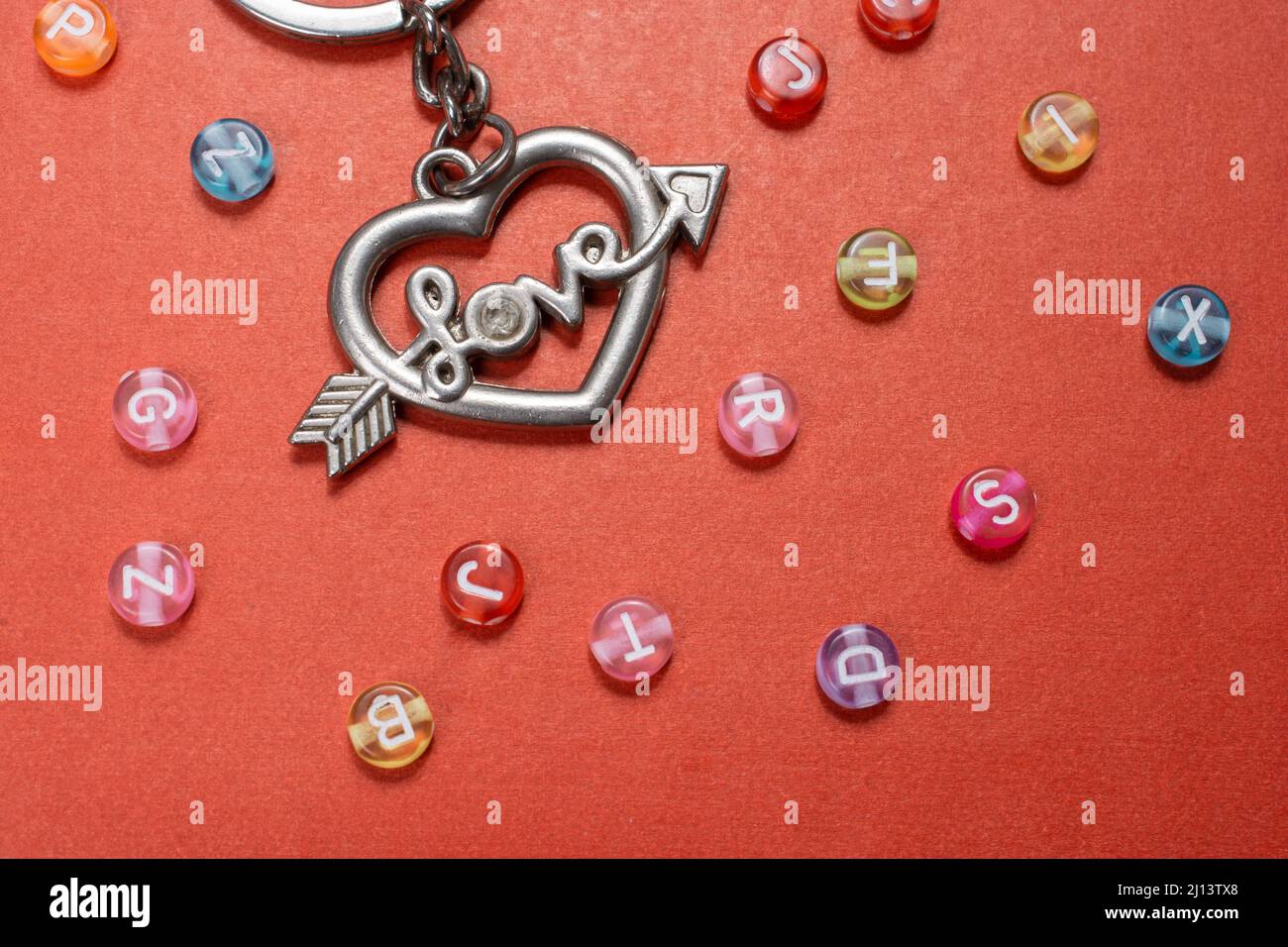Heart shape and love wording amid colorful alphabet letters Stock Photo ...