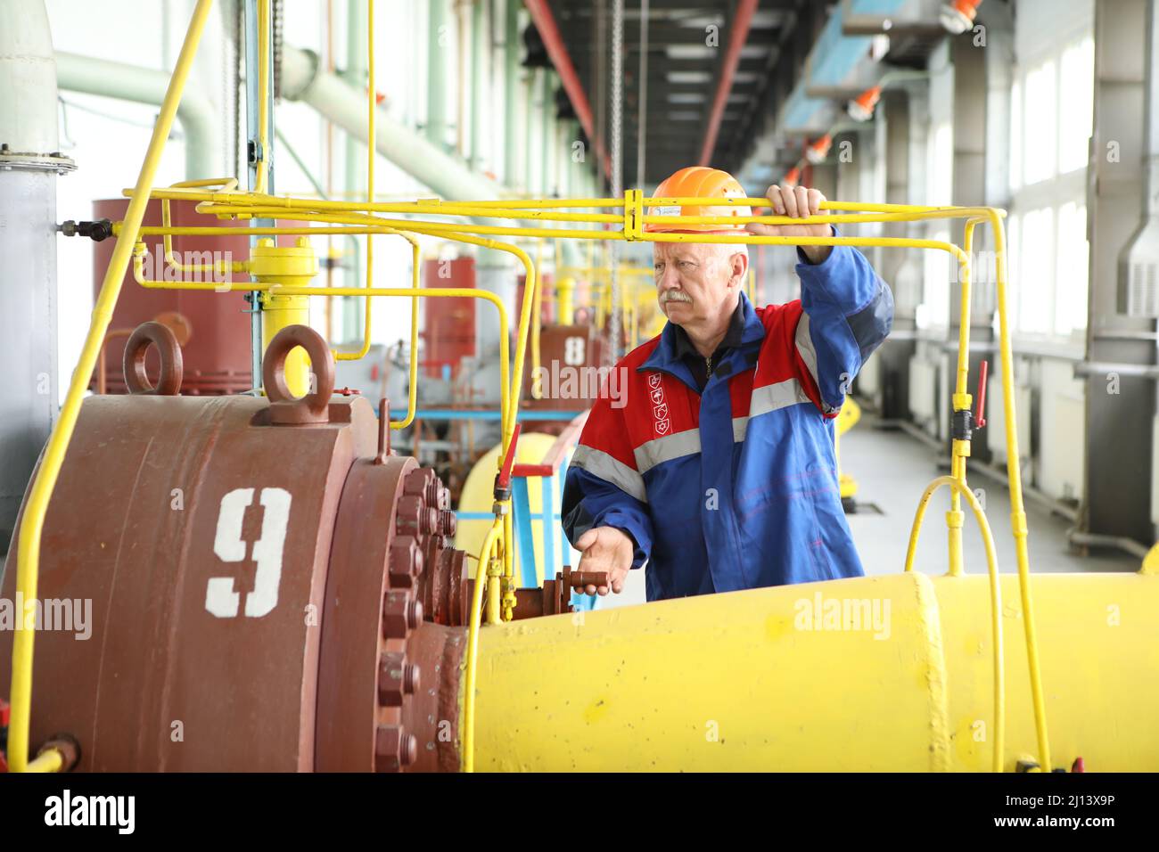 Workers at the oil and gas station. Shut off the gas, control station