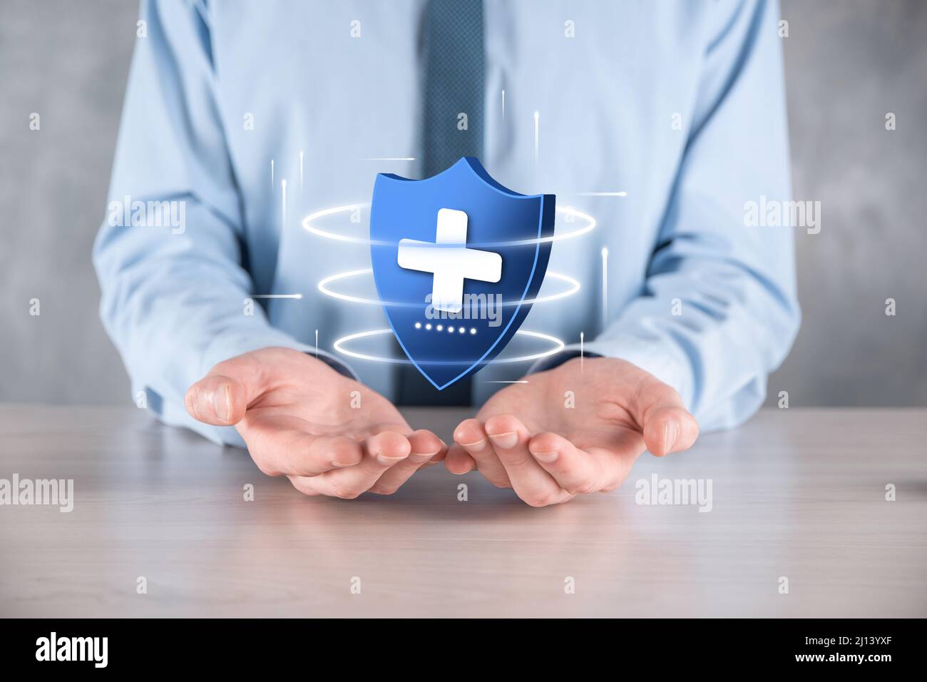 Businessman hold Shield with plus Low polygonal icon, medicine icon ...
