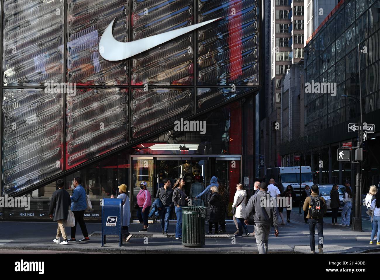 People walk past the Nike Store on Fifth Avenue in Midtown Manhattan in New York Stock Photo Alamy