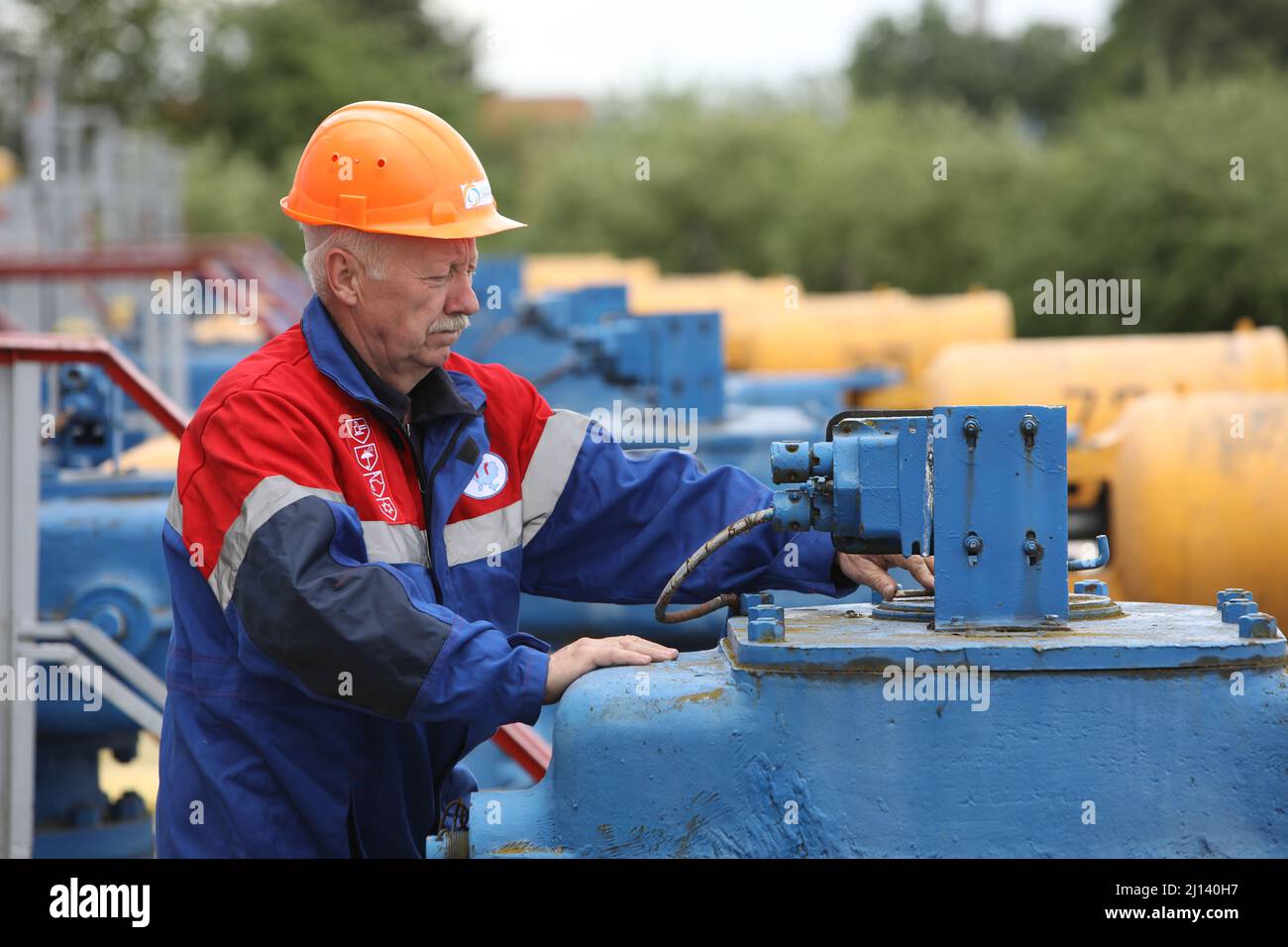 Workers at the oil and gas station. Shut off the gas, control station