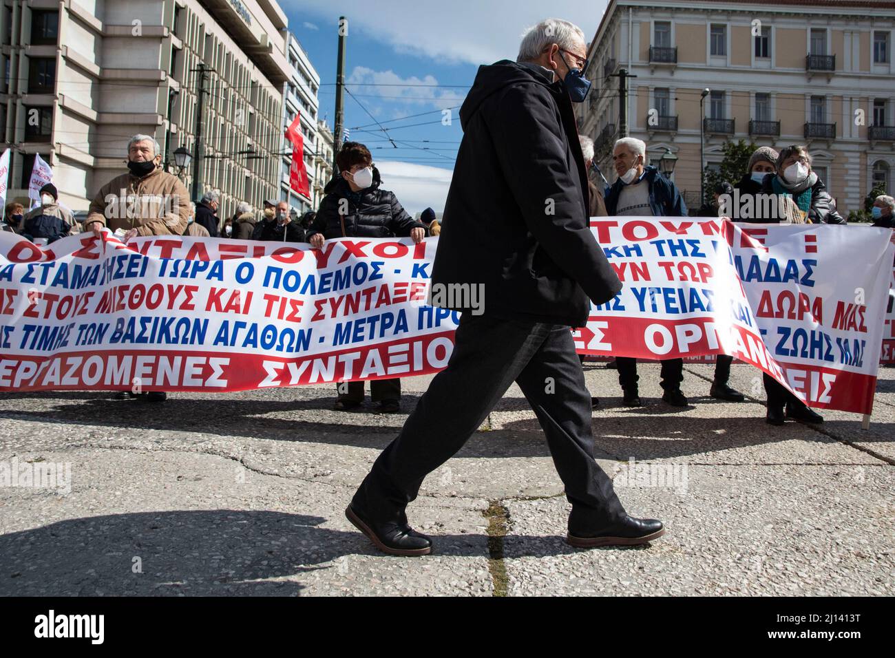 Athens, Greece. 22nd Mar, 2022. Protesters hold placards and shout slogans. Pensioners' unions staged a demonstration and marched to the ministry of finance, protesting over the rising cost of living and the deterioration of the quality of life during the, more than a decade, greek financial crisis. Credit: Nikolas Georgiou/Alamy Live News Stock Photo