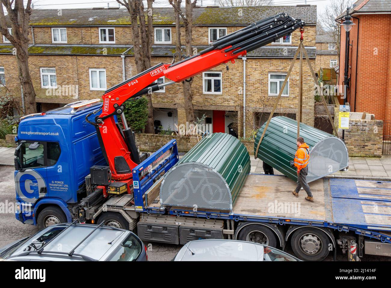 A lorry installing a pair of Cycle Hoop bicycle storage hangars in a