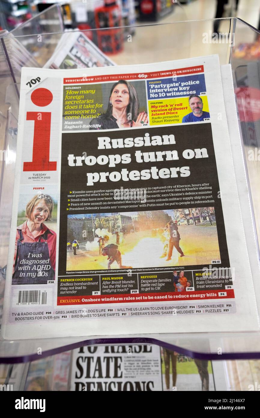 'Russian troops turn on protesters' in Kherson attack i newspaper front page Ukraine war headline on newsstand 22nd March 2022 London UK Great Britain Stock Photo