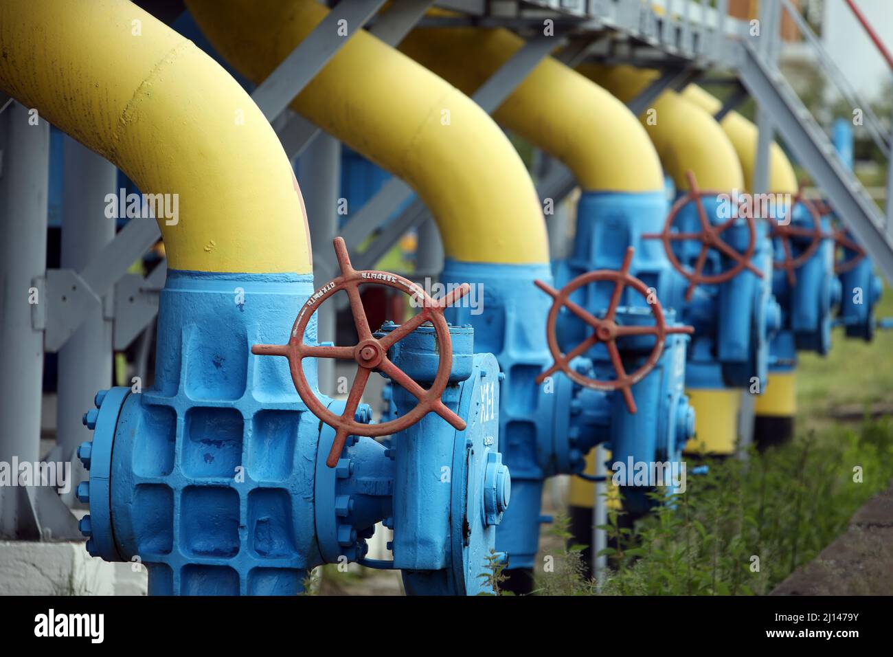 Gas transportation system. Booster pumping station for gas. filling station and gas tanks. Transportation around the world. Oil and gas sector. turbin Stock Photo