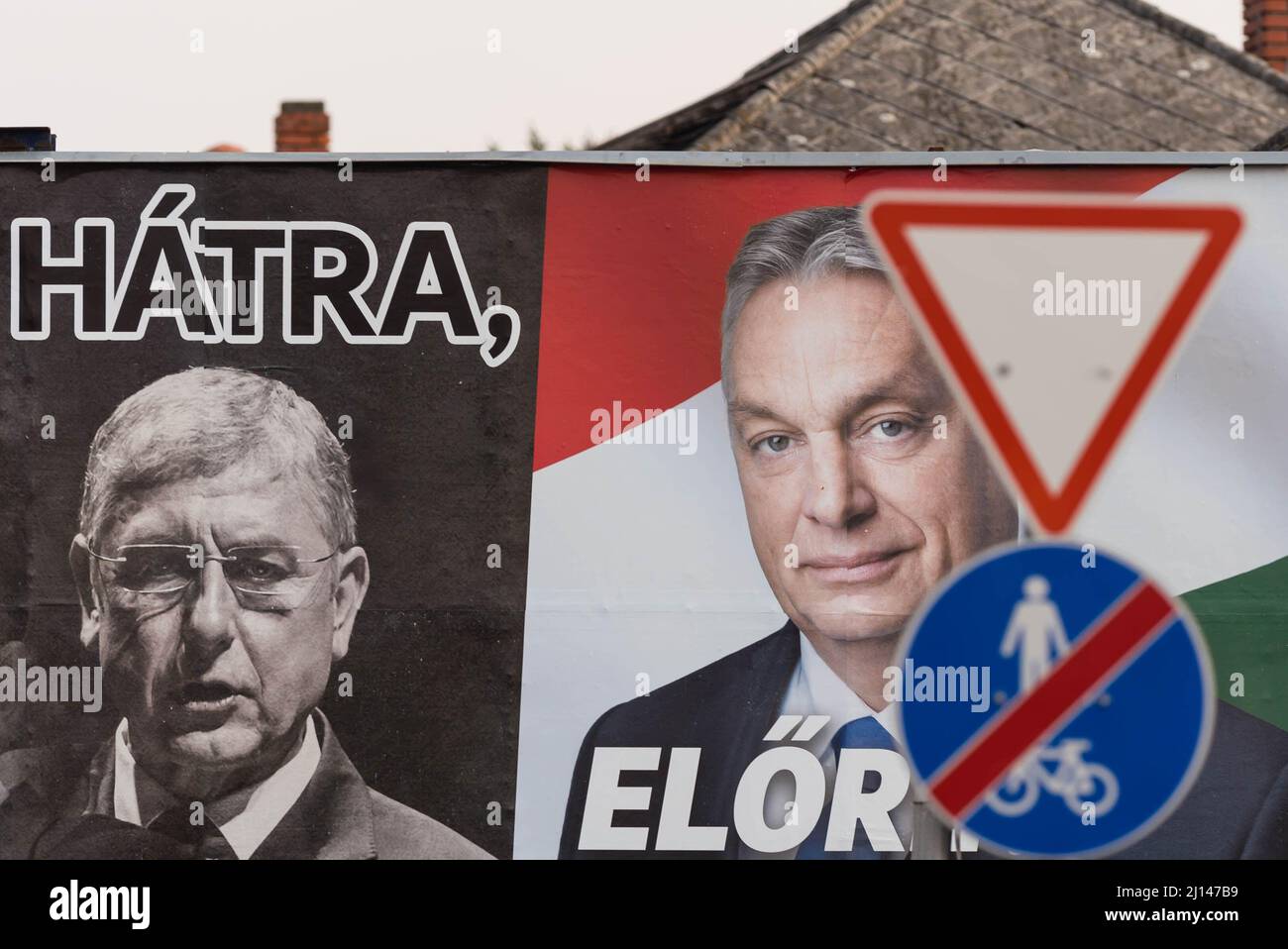 Mosonmagyarovar, Hungary. 18th Mar, 2022. Election billboard for Fidesz party placed on the street of Mosonmagyarovar. On the billboard (from left to right) former prime minister Ferenc Gyurcsany, and Hungarian prime minister and leader of Fidesz Viktor Orban. Mosonmagyarovar is the town in northwest Hungary located approx. 160 kilometers from Hungarian capital Budapest. Peter Marki-Zay will challenge prime minister Viktor Orban in the upcoming parliamentary elections, which will be held on the 3rd of April 2022. (Photo by Tomas Tkacik/SOPA Images/Sipa USA) Credit: Sipa USA/Alamy Live News Stock Photo