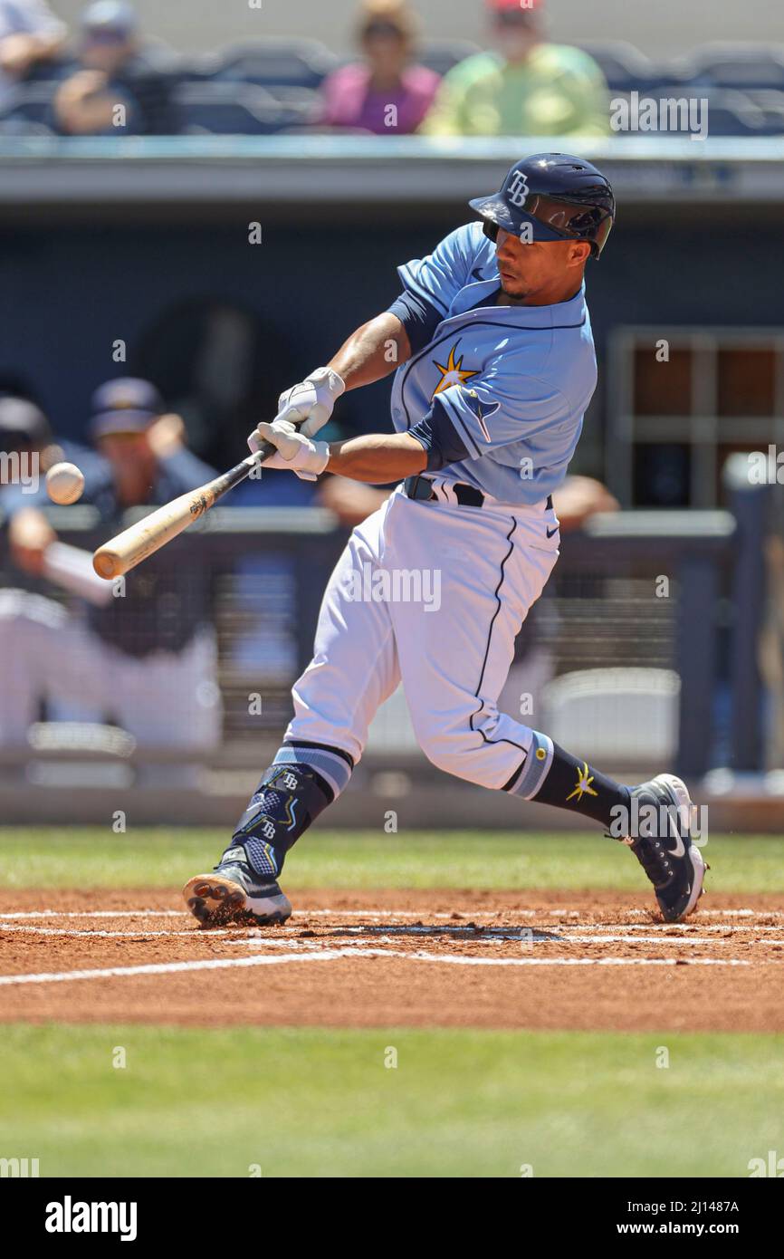 Port Charlotte, FL USA:  Tampa Bay Rays catcher Francisco Mejia (21) hits a ball to centerfield during a spring training baseball game against the Pit Stock Photo