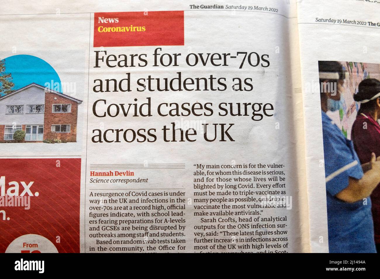 'Fears for over 70s and students as Covid cases surge across the UK' Coronavirus Guardian newspaper headline19 March 2022 London England Great Britain Stock Photo