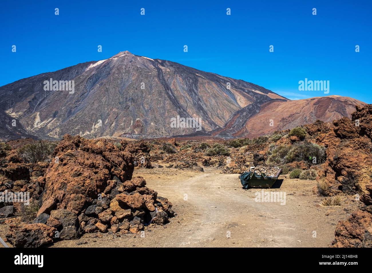 Skip full of rubble at the location of work at the old sanatorium site to remove all traces of the buildings from the Las Canadas del Teide national p Stock Photo