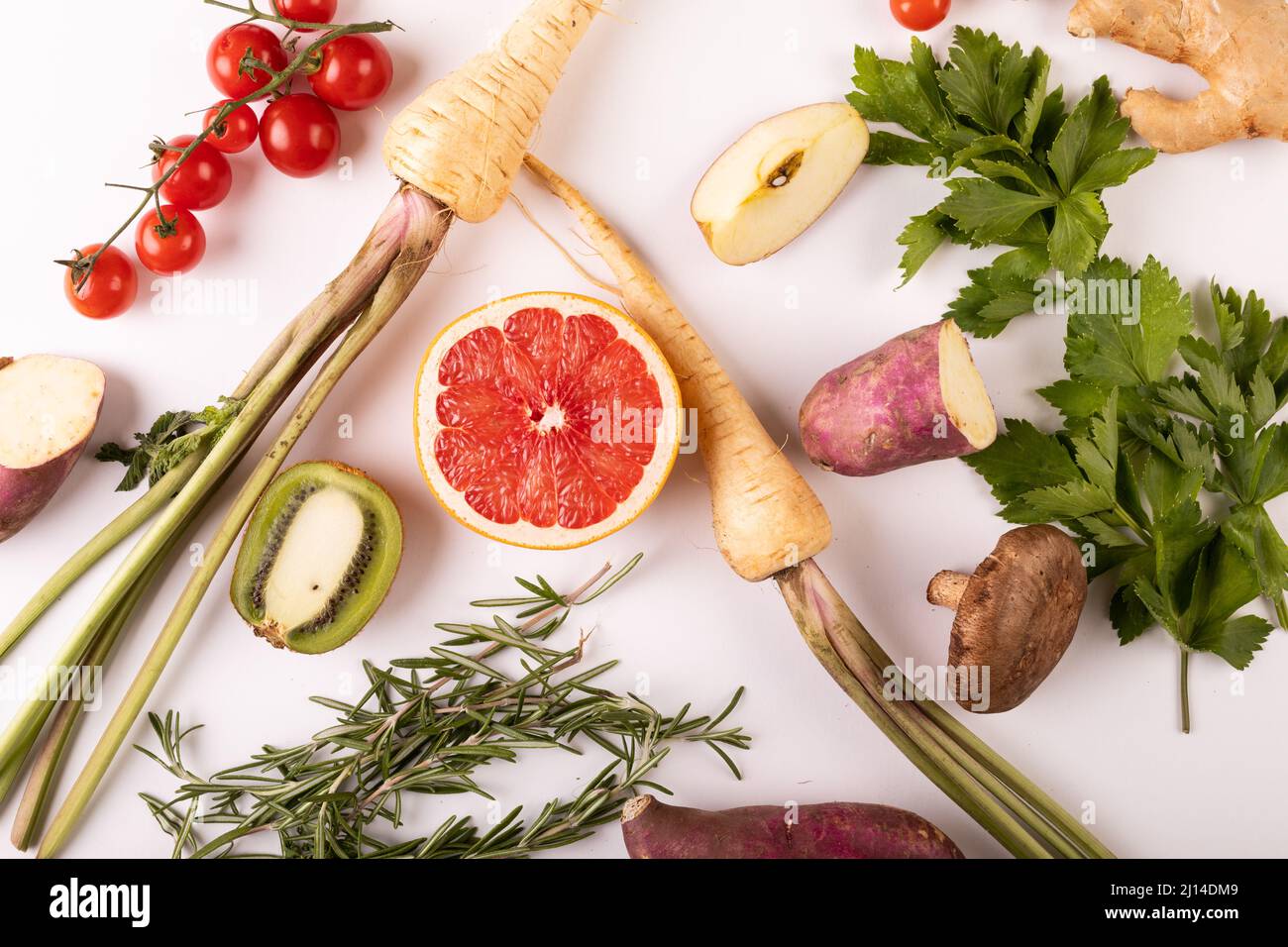 Overhead view of fresh vegetables and fruits on white background Stock Photo