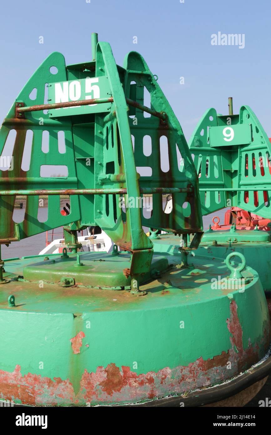 Green and red buoys on the quayside at Kings Lynn Stock Photo Alamy