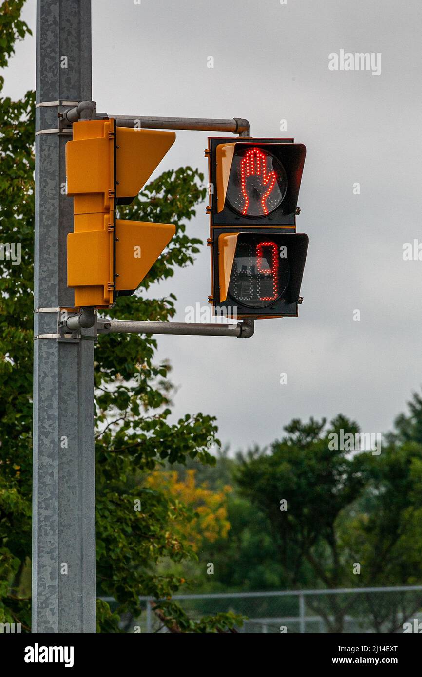 Ontario, Canada Traffic light showing the hand sign as an indication