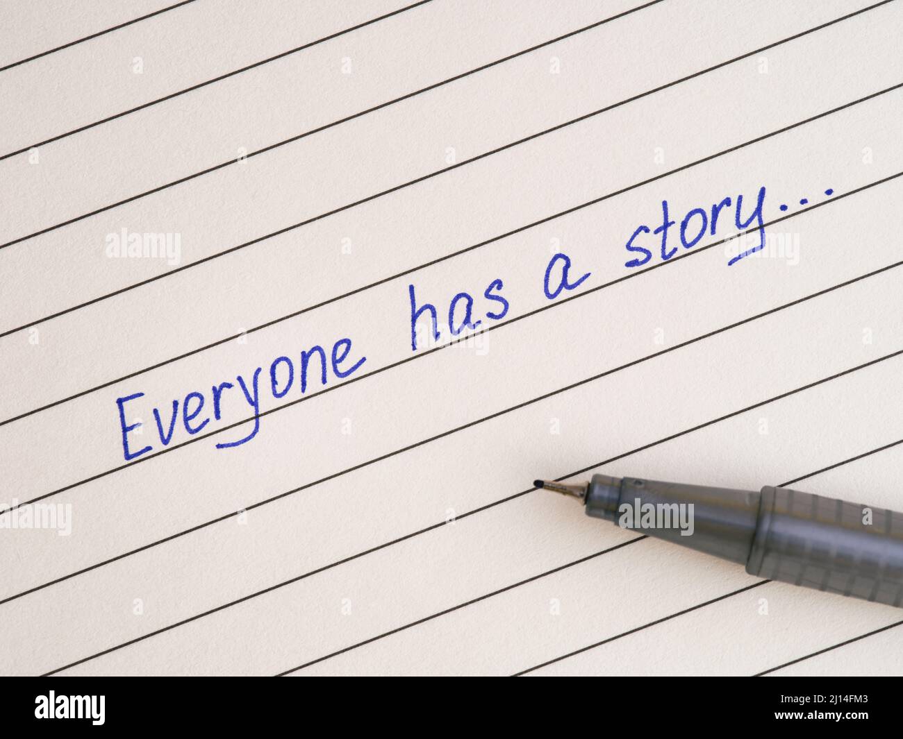 Handwriting Text Everyone Has A Story On A Lined Paper With A Pen Stock Photo Alamy