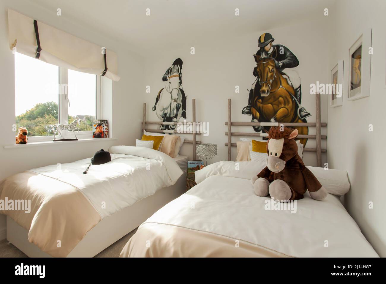 Childs bedroom, girls bedroom, show jumping theme, horses, horse, horse mad,horse jumping. Stock Photo