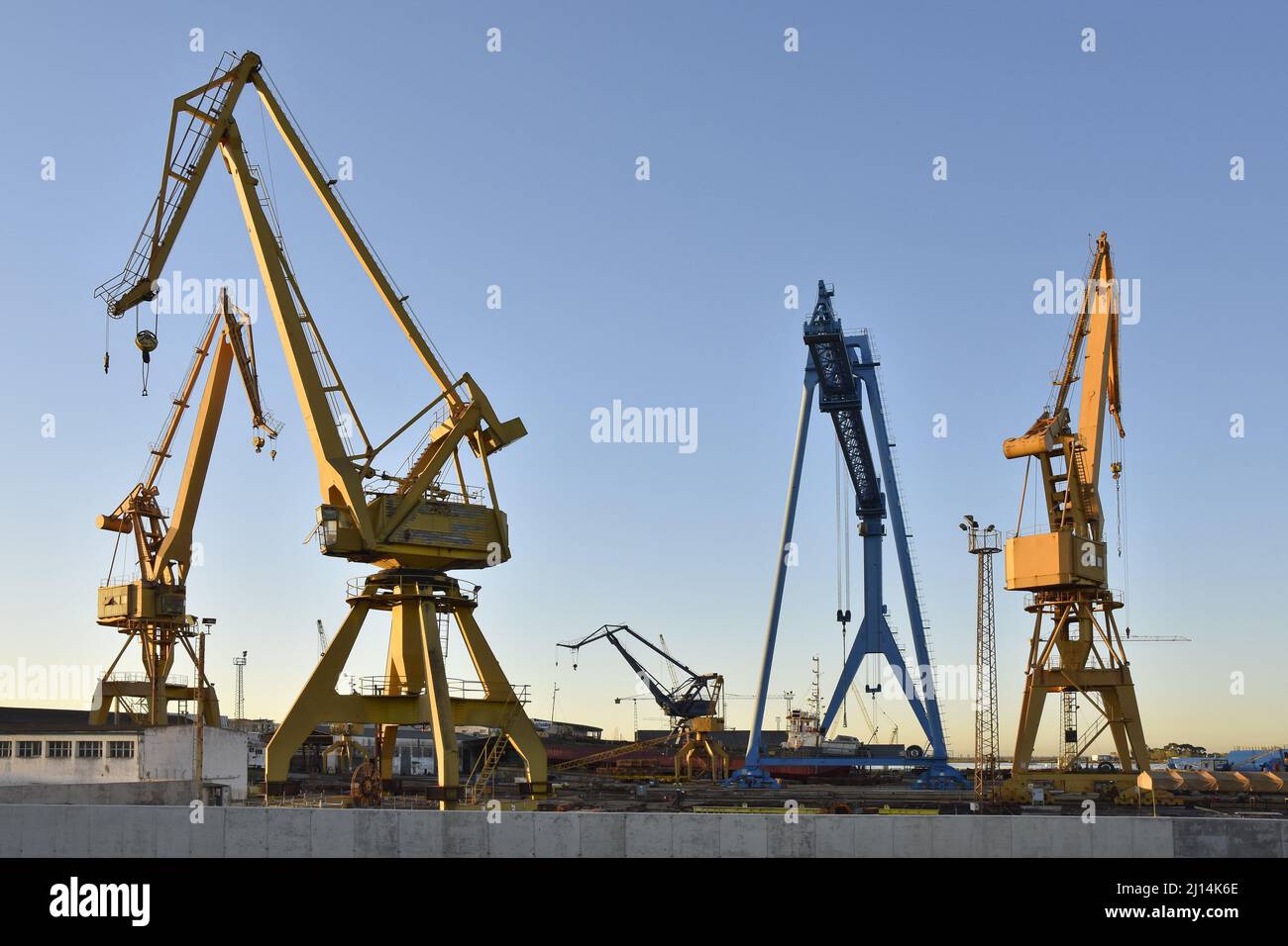 Derrick cranes in the port of Huelva, Andalusia Spain Europe Stock
