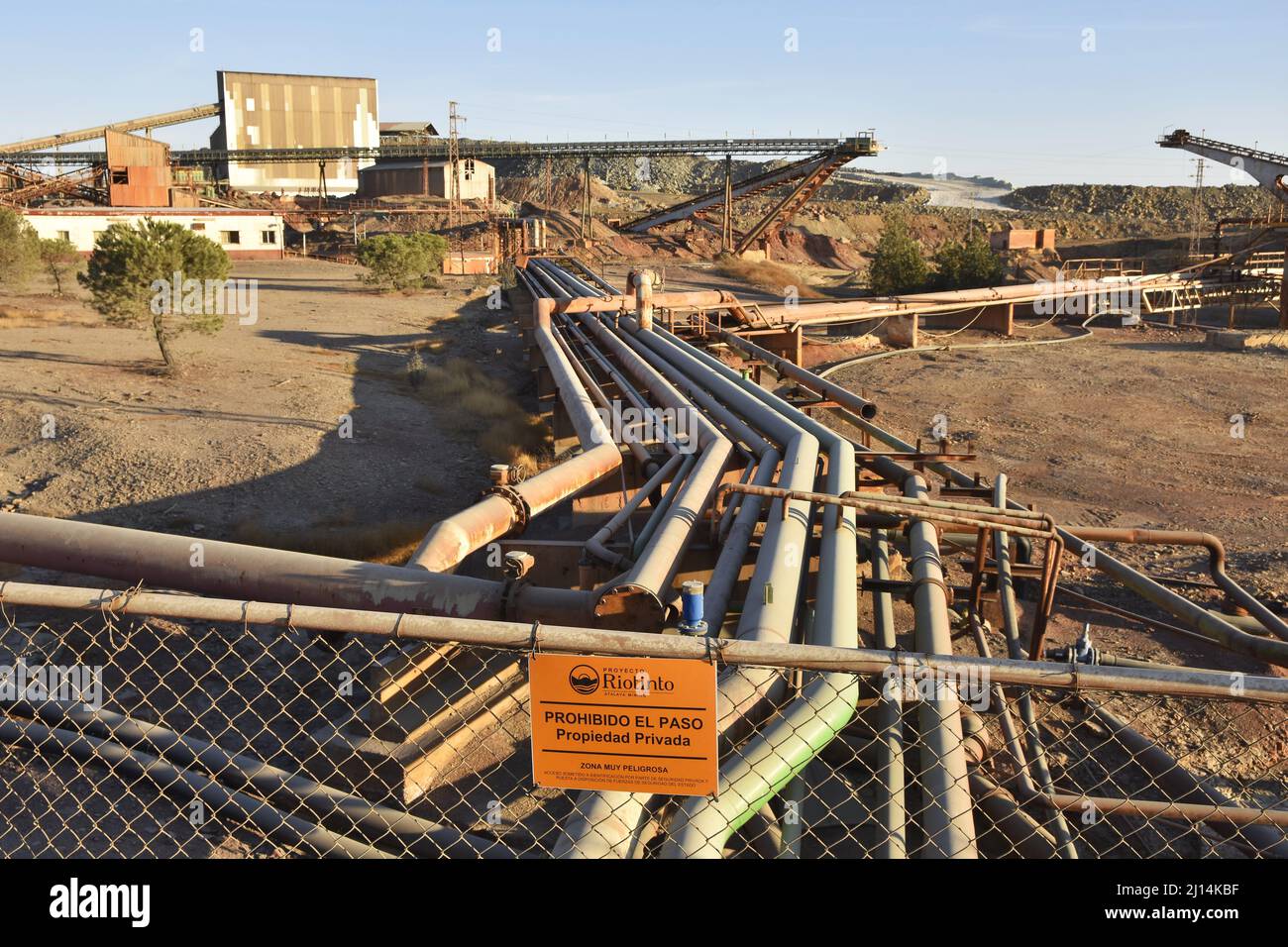 Pipes and conveyor belts at Minas de Riotinto open-pit mining site, province of Huelva southern Spain. Stock Photo