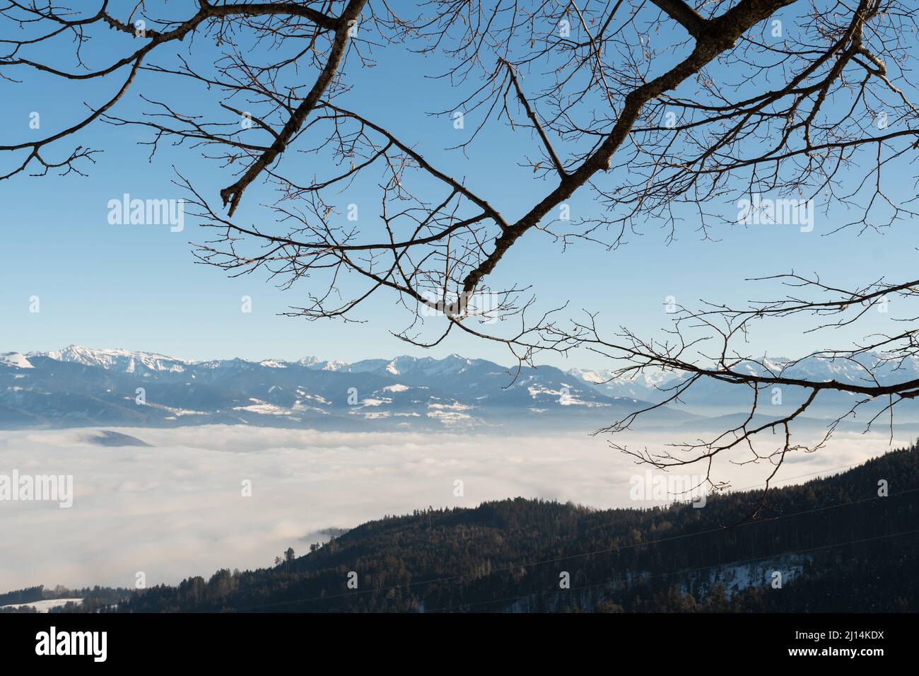 Gais, Appenzell, Switzerland, January 26, 2022 Foggy day over the swiss and austrian rhine valley with the alps in the background Stock Photo