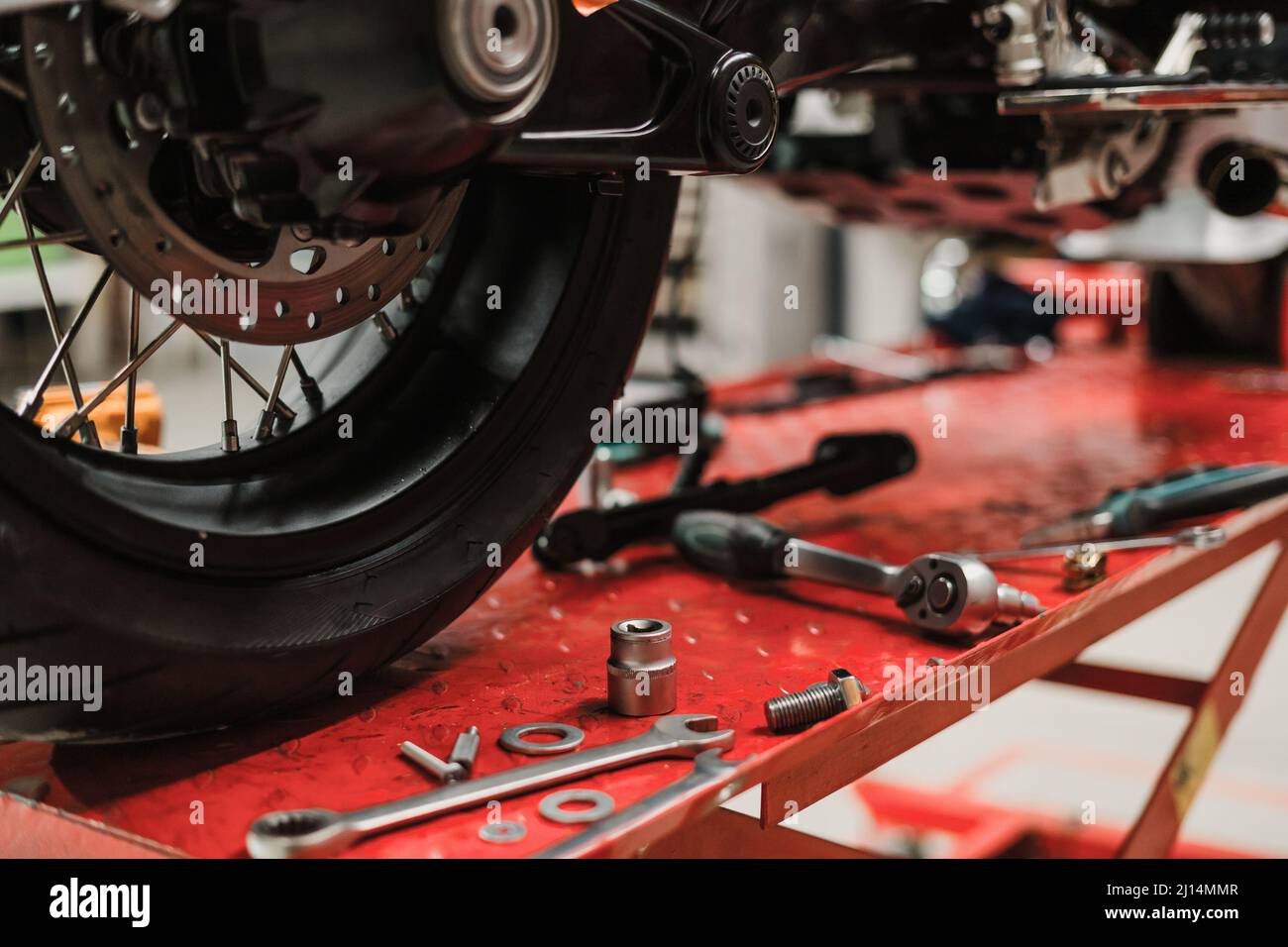 Fixing Custom motorcycle standing in repair shop. Instruments and