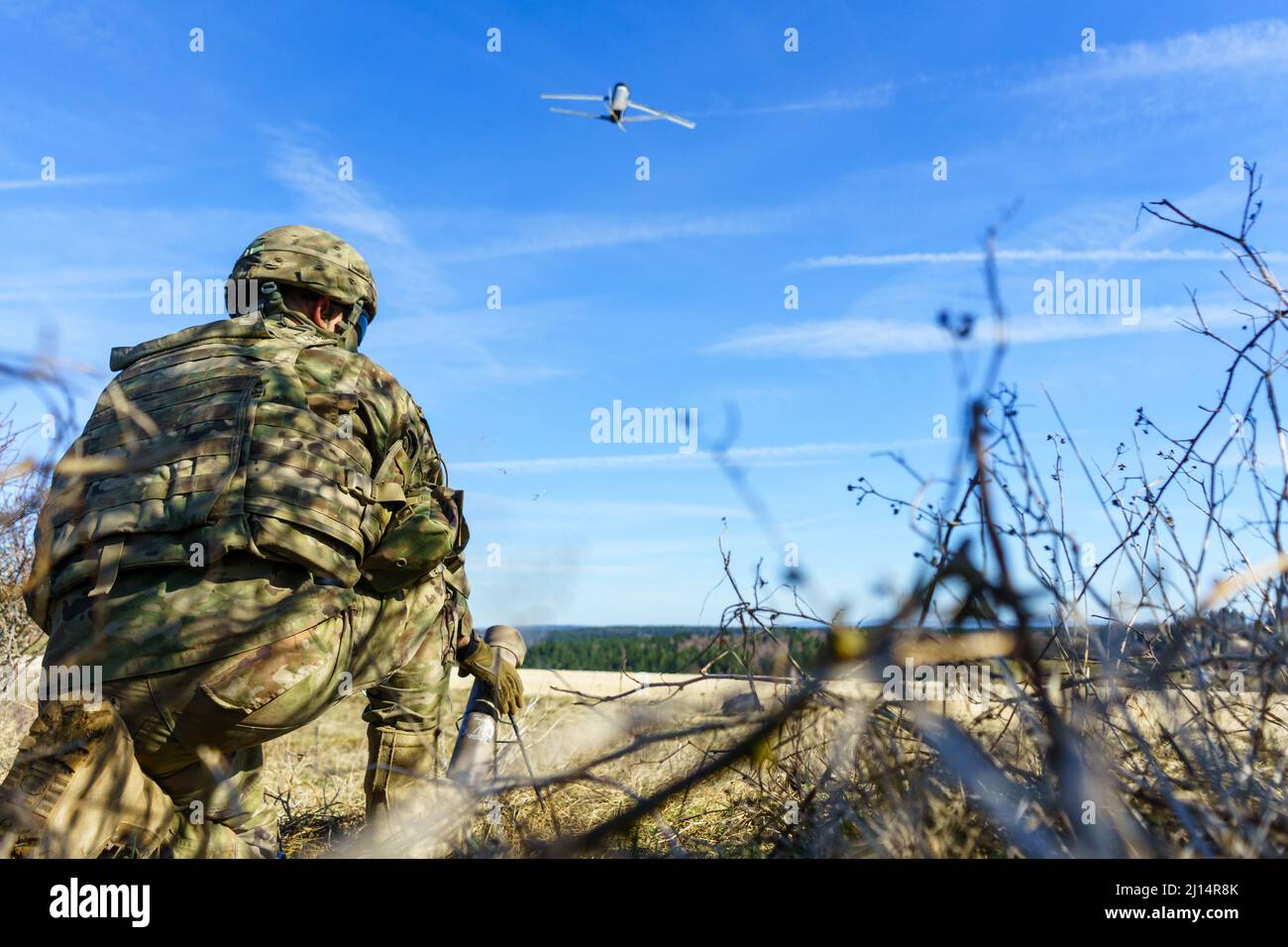 Grafenwoehr, Germany. 06 April, 2018. U.S. Army Pvt. 1st Class Brandon Norton, with 1st Infantry Division, launches a Switchblade 300 lethal miniature aerial missile system during a Robotic Complex Breach Concept assessment and demonstration at Grafenwoehr Training Area, April 6, 2018 in Grafenwoehr, Germany.  Credit: Sgt. Gregory T. Summers/US Army/Alamy Live News Stock Photo