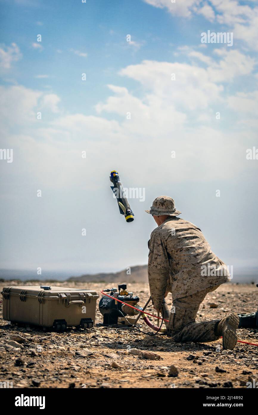 Twentynine Palms, United States of America. 24 September, 2021. U.S. Marine Corps Lance Cpl. Brandon Janik, a rifleman with 1st Battalion, 3d Marines, launches a Switchblade 300 lethal miniature aerial missile system during a training exercise at Marine Corps Combat Center Twentynine Palms, September 24, 2021 in Twentynine Palms, California.  Credit: Cpl. Alexis Moradian/US Marine Corps/Alamy Live News Stock Photo