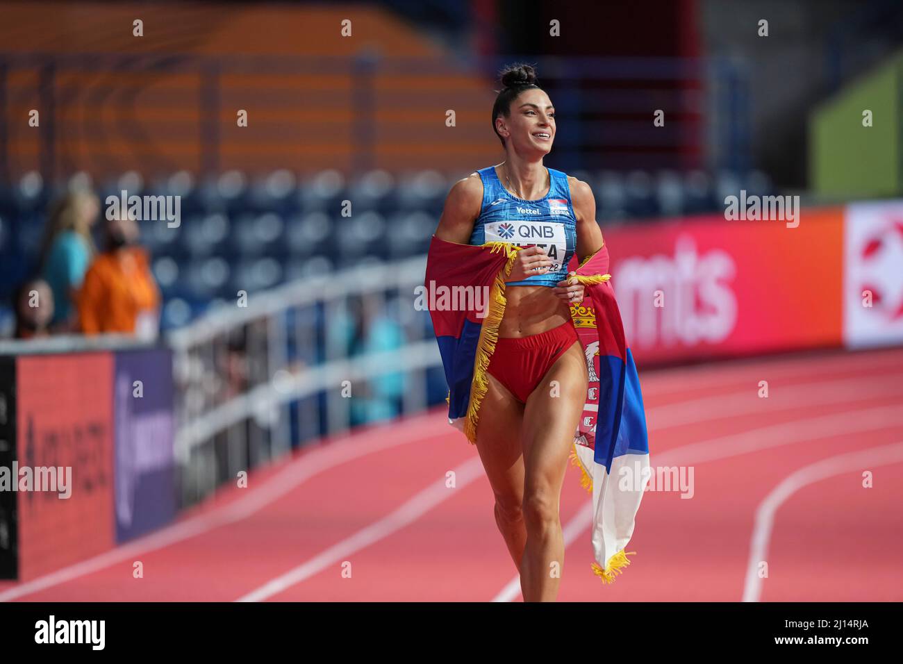 Ivana Vuleta Spanovic celebrating her victory with the Serbian flag at the Belgrade 2022 Indoor World Championships. Stock Photo